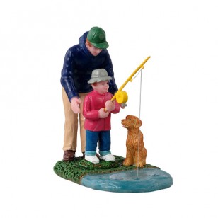 HIS FIRST FISHING LESSON